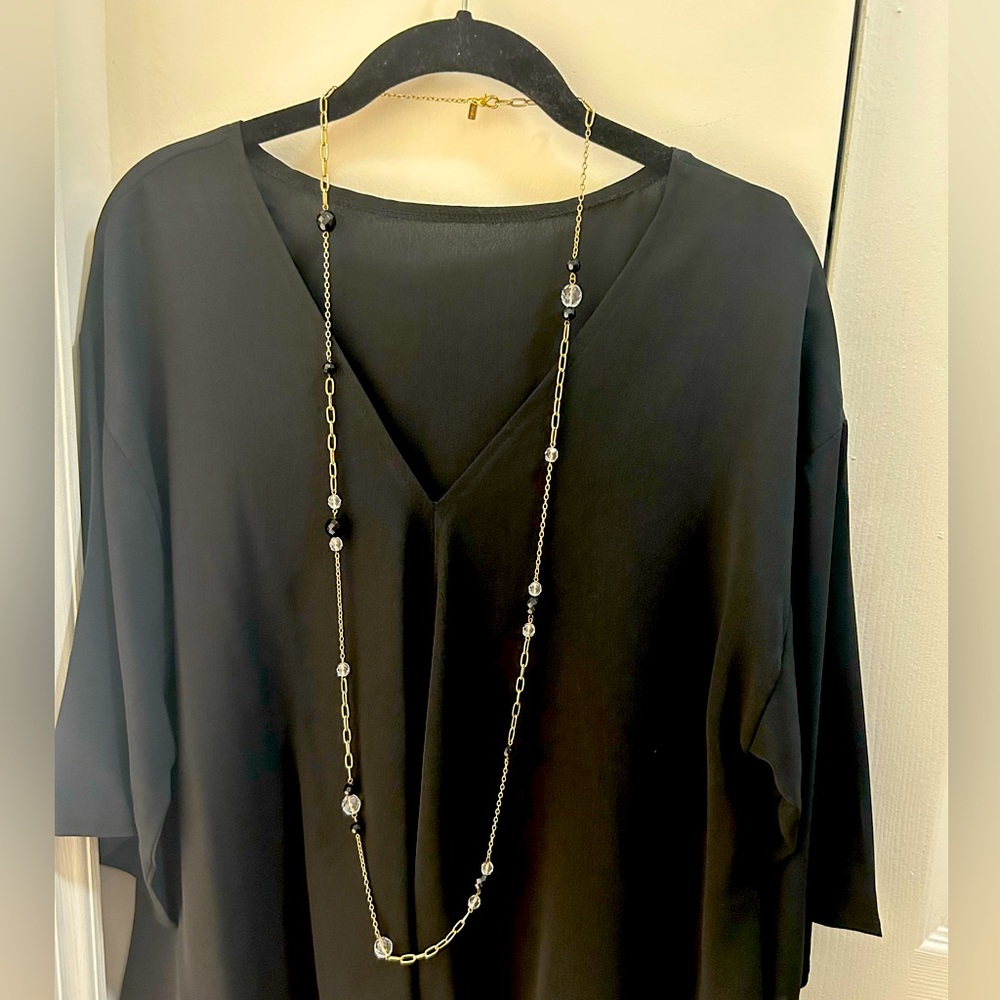 24 inch adjustable Rachel gold color necklace with black and crystal accents